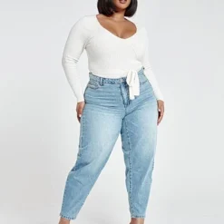 Fashion To Figure High Rise Light Wash Curved Outseam Jeans